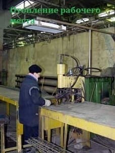 Рабочий в зоне отопления инфракрасными обогревателями завод «ЗАРТА» город Ярославль